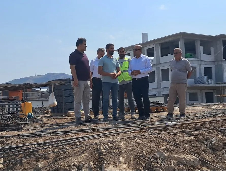 KAYMAKAM CAN, DEVAM EDEN OKUL İNŞAATLARINI YERİNDE İNCELEDİ
